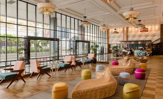 Hotel Jen lobby and vibrant guestrooms