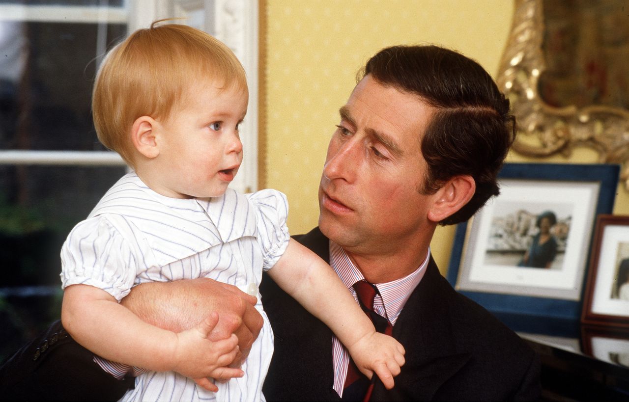Prince Harry as a baby with his dad Prince Charles