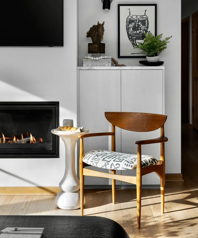 living room corner with wooden chair