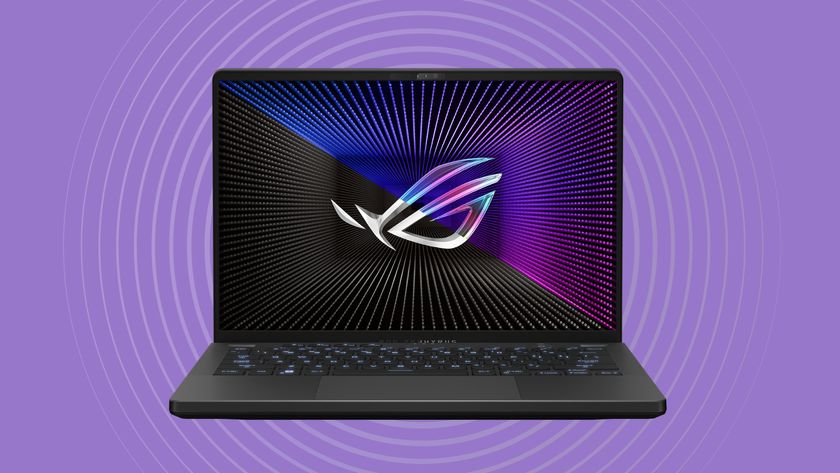 Asus Zephyrus G14 gaming laptop on purple background