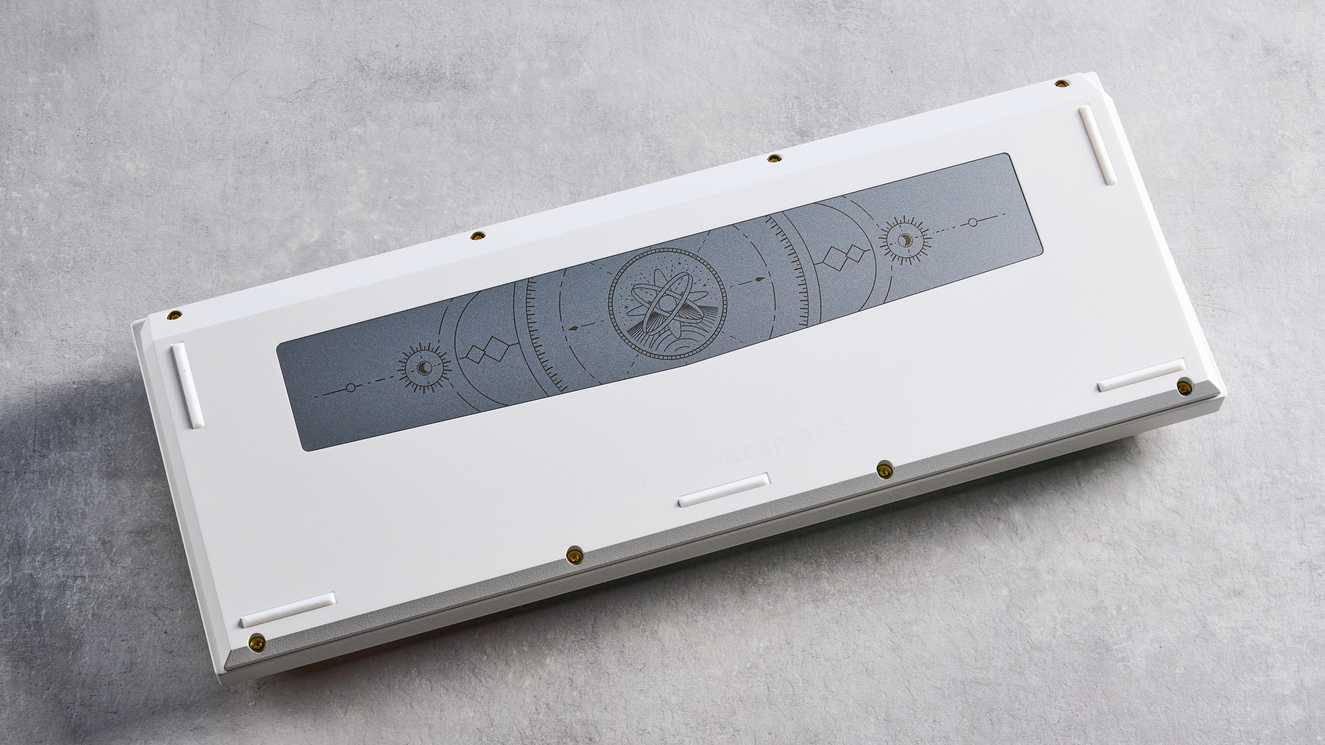 Keychron Q3 Ultra 8K photographed on a grey table in front of a blue background