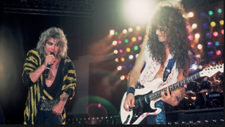 Ozzy Osbourne on stage with Jake E. Lee