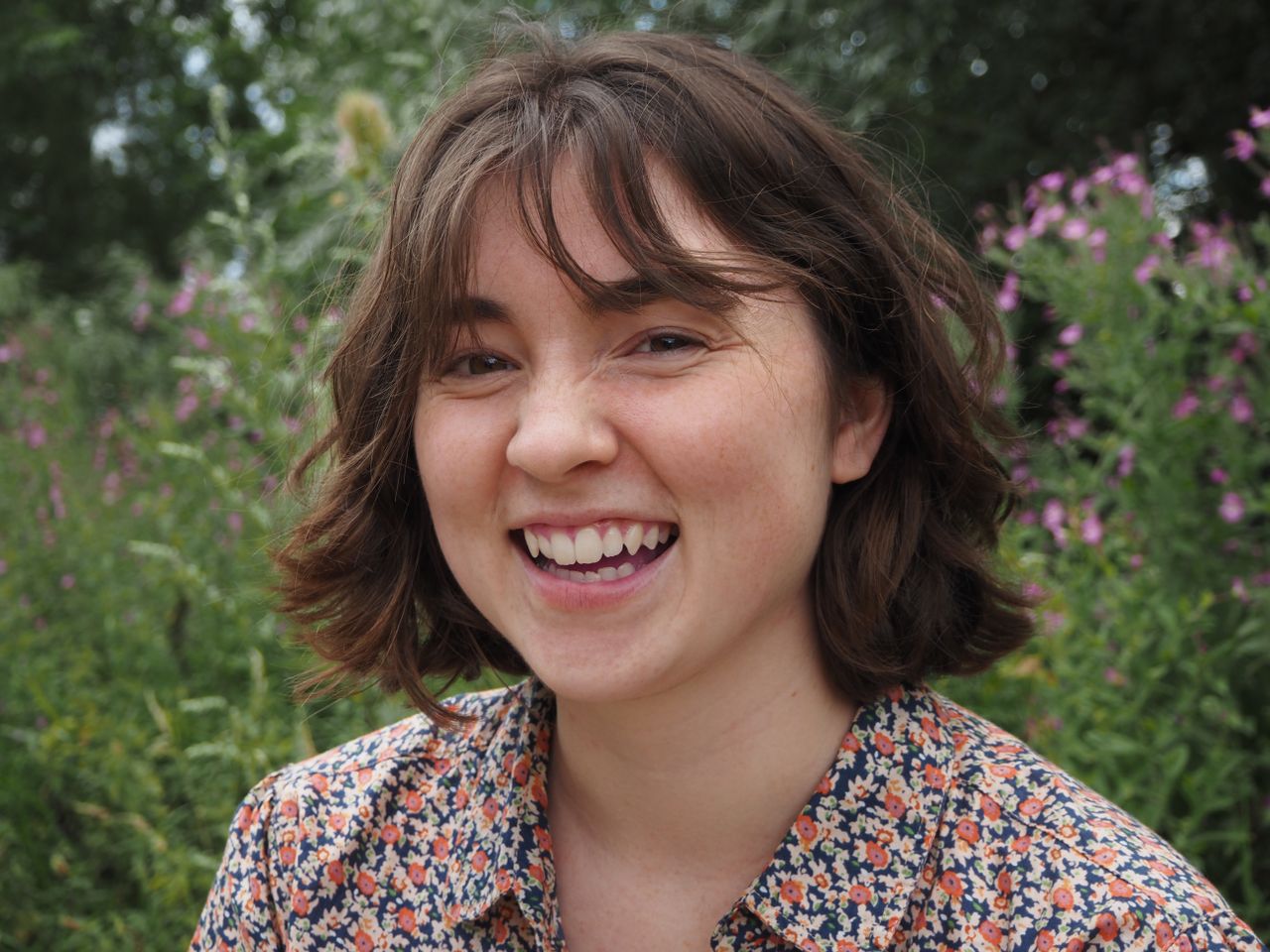 Olympus OM-D E-M10 Mark IV sample portrait of smiling woman