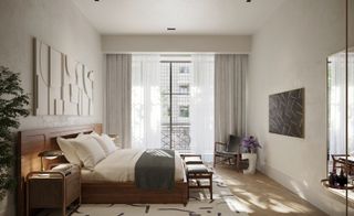 Inside a modern contemporary bedroom with a double bed, wood frame and headboard, benches at the end, white linen and grey throw, side table with lamp.