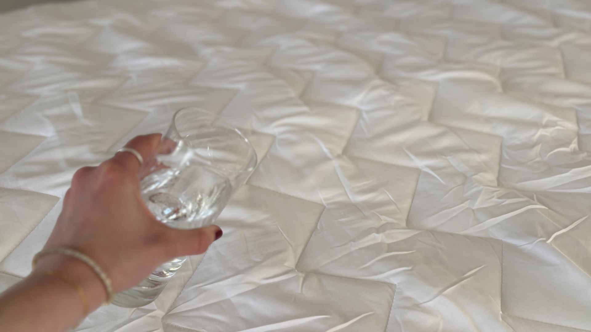 Testing the Fogarty Temperature Balance Mattress Protector on the bed
