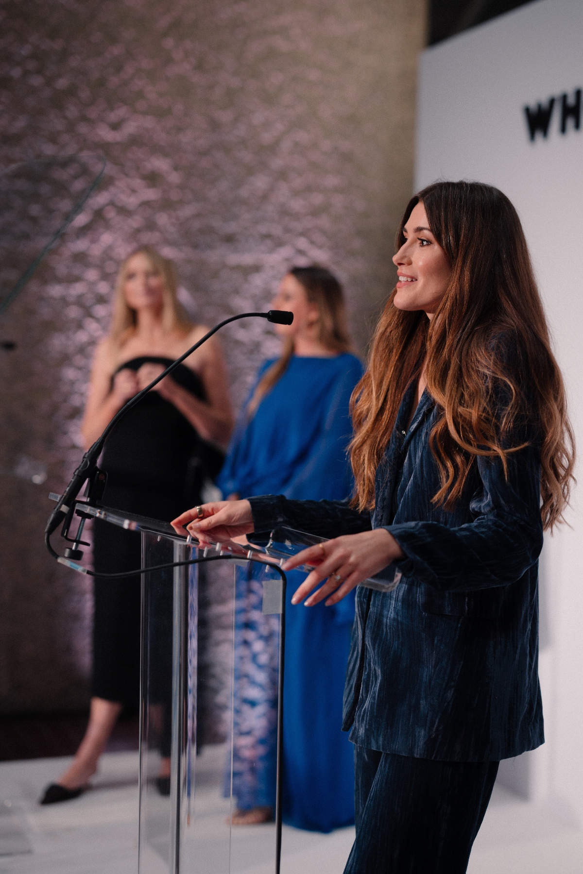 Beauty editor Eleanor Vousden presenting at the Who What Wear UK Next in Beauty Awards