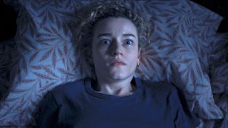 Julia Garner waking up for a nightmare in Weapons