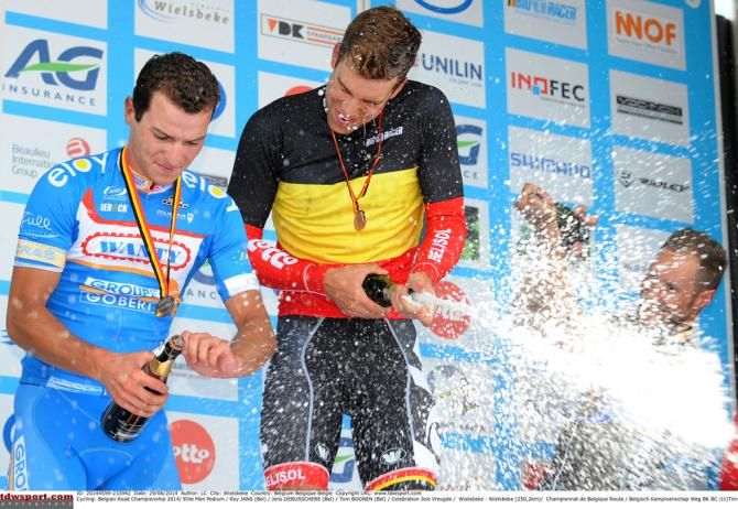 The podium sprays the champagne