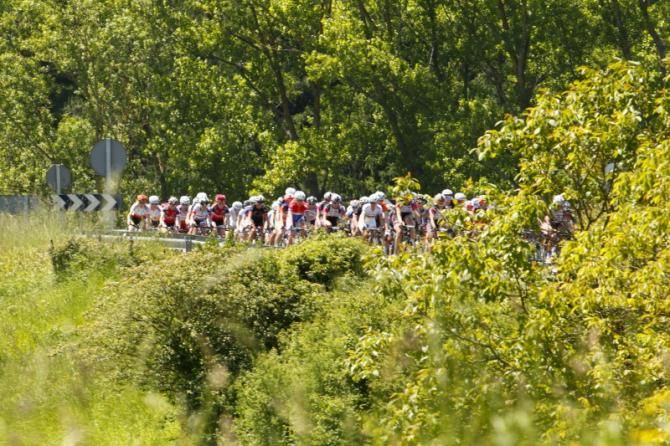 The peloton climbing on the small lap