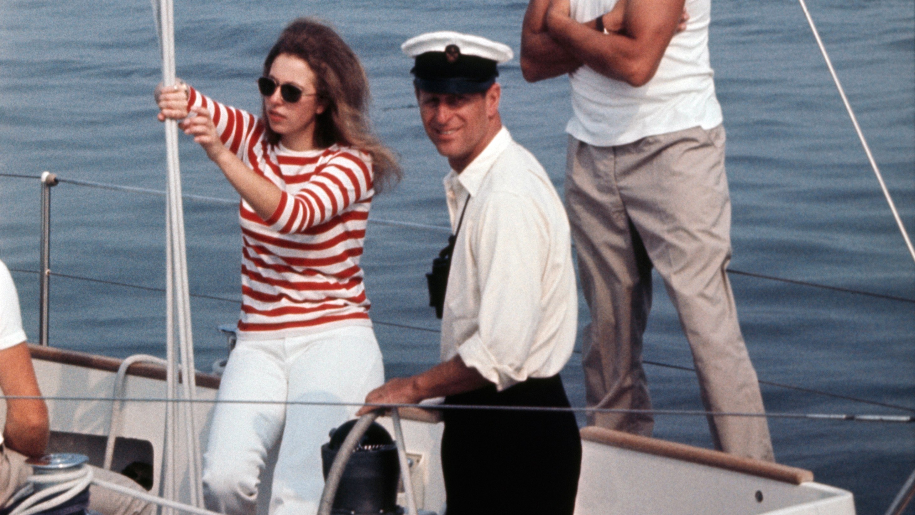 Princess Anne and Prince Philip smile on board a boat headed for the Isle of Wight 1970