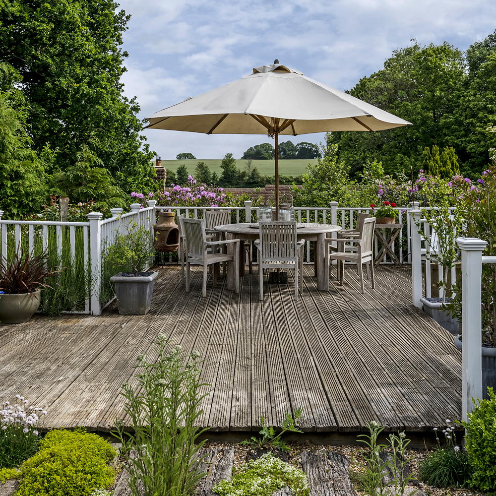 garden with wooden chairs