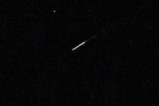 A meteor streaks by during a video of the Orionid meteor shower taken Oct. 19 in Arcadia, Florida by astrophotographer Victor Rogus.