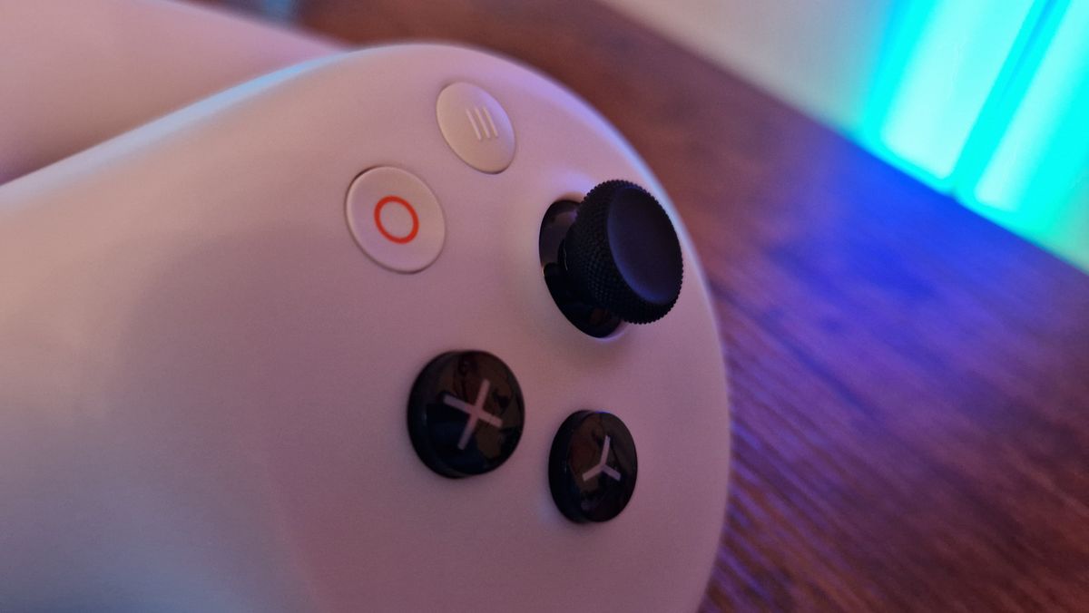 Pico 4 Ultra review image showing the controller's extra button