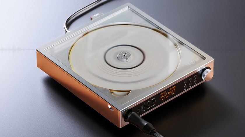 A 3/4 shot of the FiiO DM15 R2R portable CD player on a grey surface.