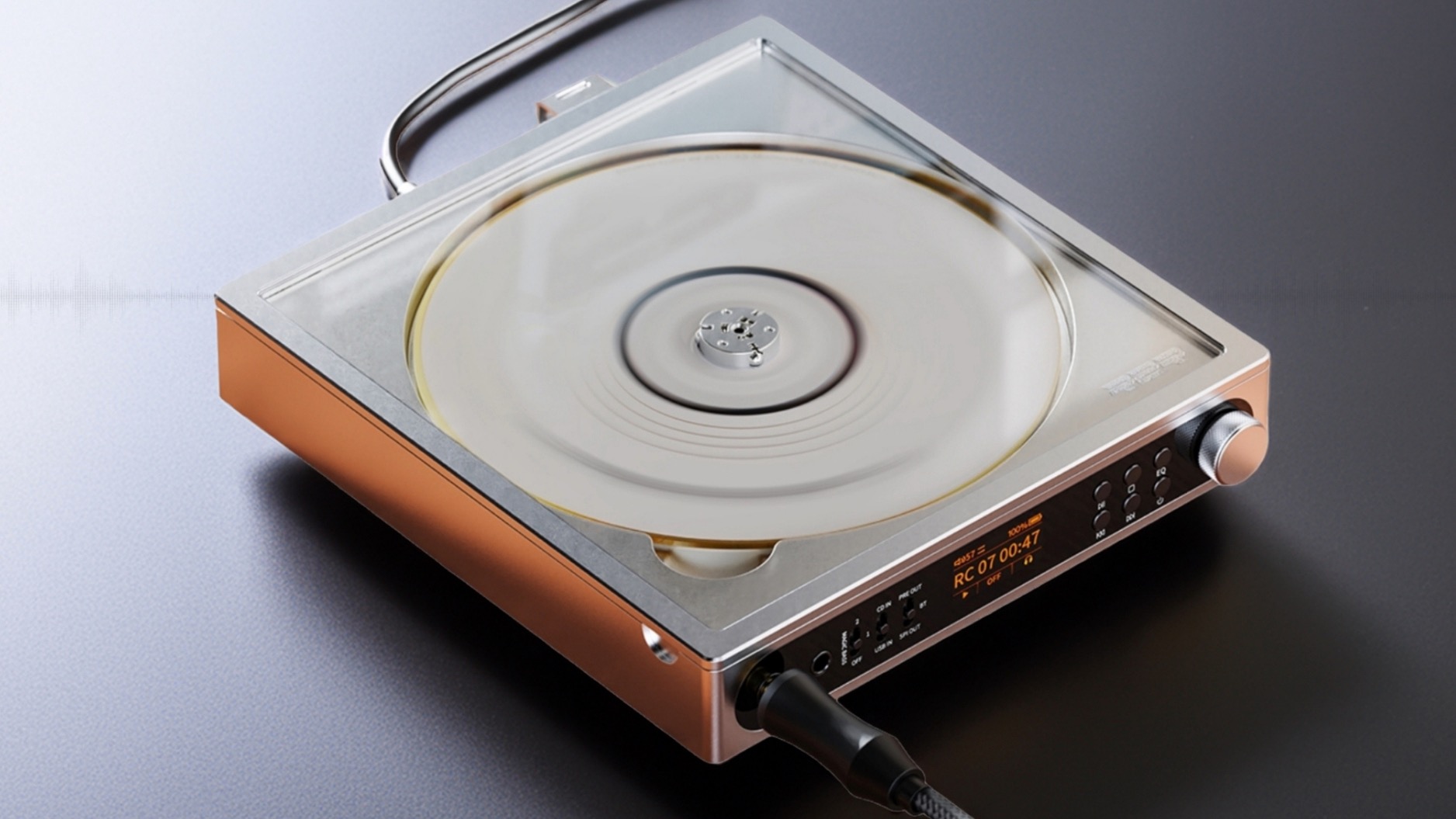 A 3/4 shot of the FiiO DM15 R2R portable CD player on a grey surface.