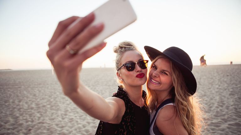 two people taking a selfie