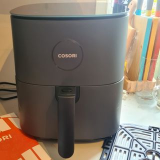 Cosori Air Fryer standing on kitchen counter