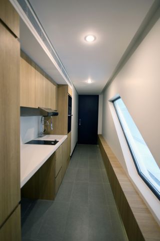 compact kitchen at micro house in Kuwait