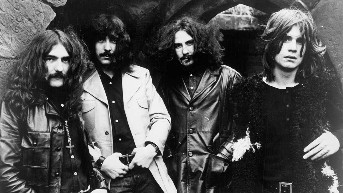 Black Sabbath standing in a line 