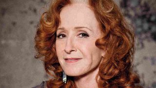 Bonnie Raitt posing for a photograph in 2016