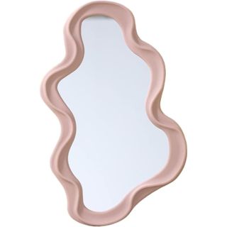 A wavy asymmetrical mirror with pink border