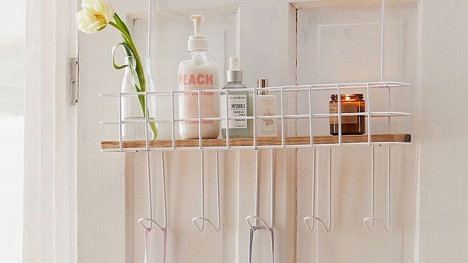 Over door storage from Urban Outfitters: Devon Over-The-Door Multi-Hook Shelf