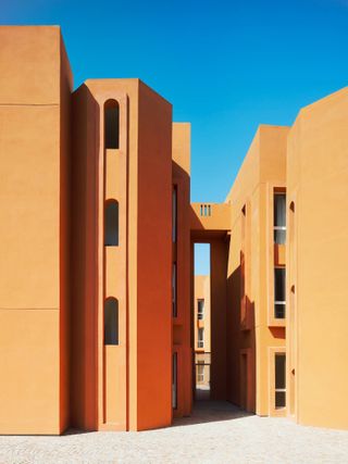 Mohammed VI Polytechnic University showcases ochre architecture against blue skies