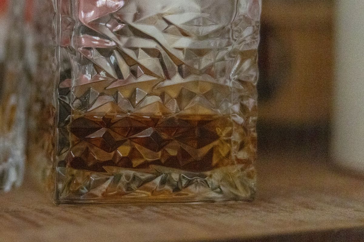 An image of a whisky decanter cropped to zoom in close