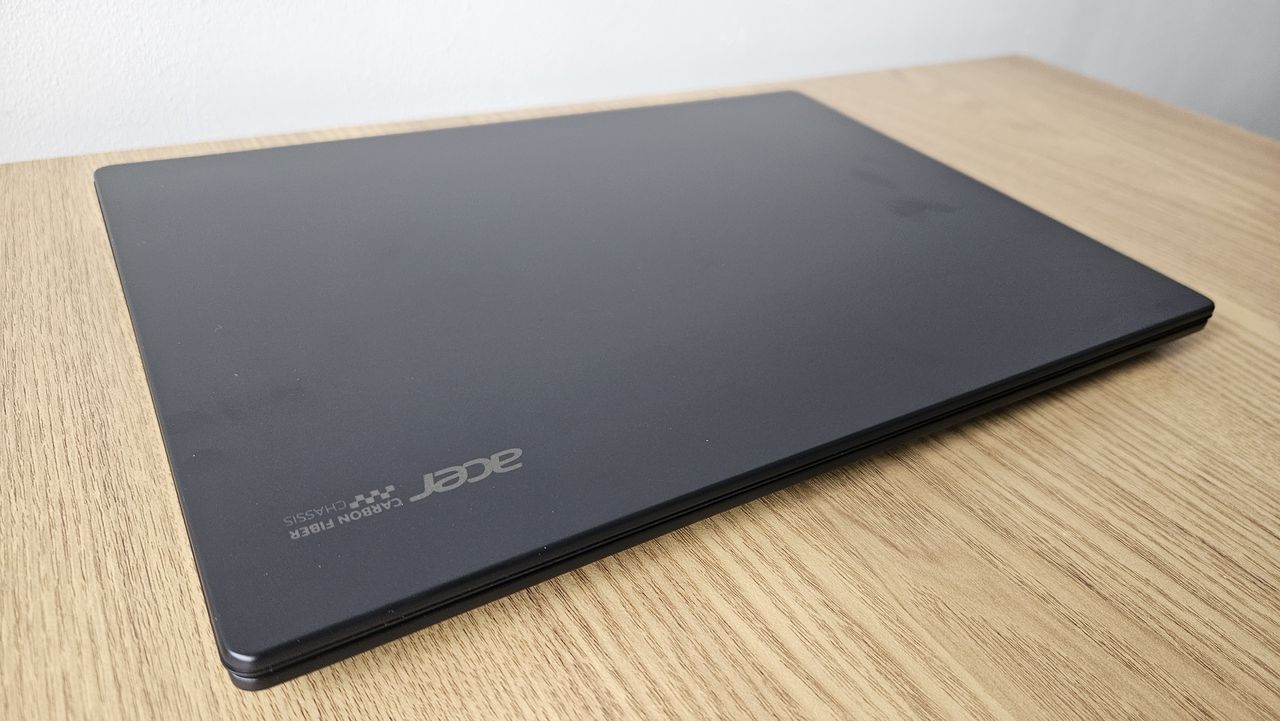 The Acer TravelMate P6 14 AI on a desk