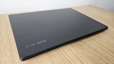The Acer TravelMate P6 14 AI on a desk