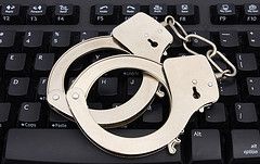 handcuffs on computer