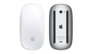 A product shot of the Apple Magic Mouse from the top and bottom