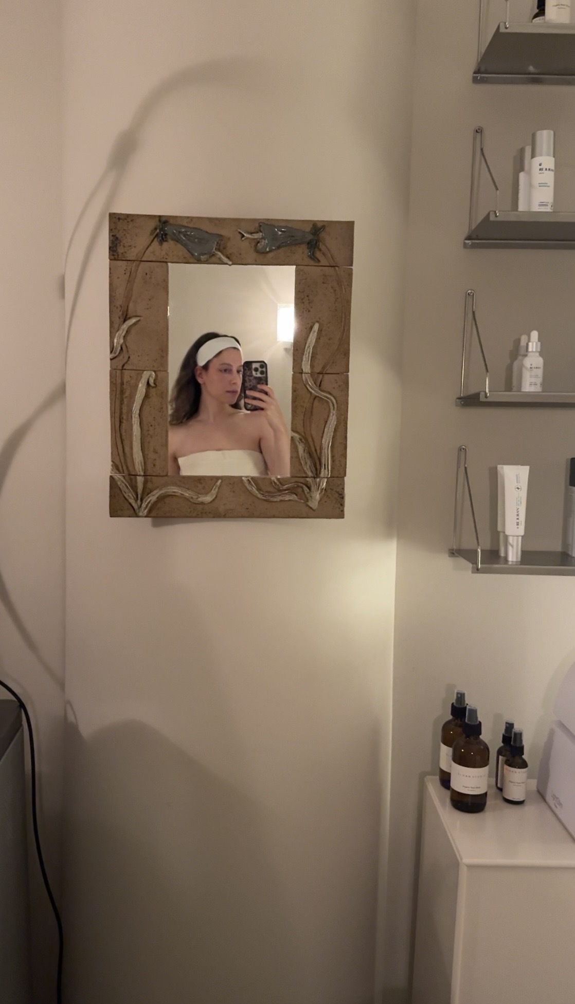Photo of Jamie Schneider receiving a facial at Sloan Studio