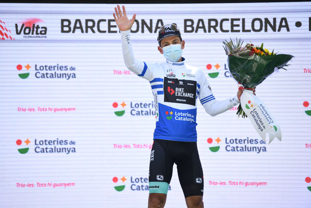 BARCELONA SPAIN  MARCH 28 Podium  Johan Esteban Chaves Rubio of Colombia and Team BikeExchange Blue Points Jersey Celebration during the 100th Volta Ciclista a Catalunya 2021 Stage 7 a 133km stage from Barcelona to Barcelona  Mask  Covid safety measures  Flowers  VoltaCatalunya100  on March 28 2021 in Barcelona Spain Photo by David RamosGetty Images