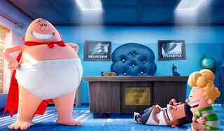 Captain Underpants strikes a heroic pose in the principal's office