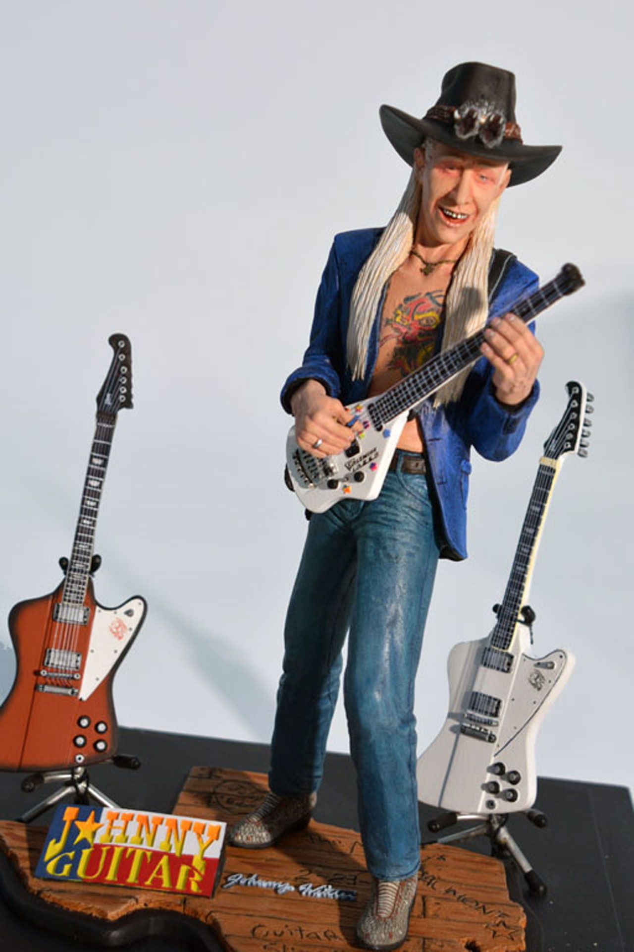 The prototype for a collectible Johnny Winter figurine that never went into production, immediately becoming much more collectable.