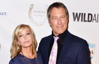 Bo Derek and John Corbett arrive at 'Evening With WildAid' at the Beverly Wilshire Four Seasons Hotel on November 11, 2017 in Beverly Hills, California