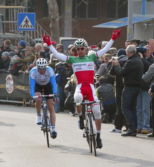 Arms aloft for winner Giovanni Visconti.