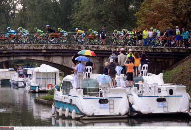 Rider pass over the Buzet-Sur-Baise City Chanel Canal