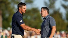 Bryson DeChambeau and Rory McIlroy shake hands on the 18th green after the final round of The Masters in 2025