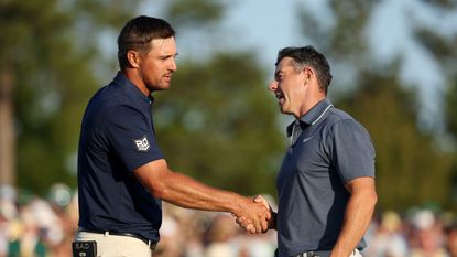 Bryson DeChambeau and Rory McIlroy shake hands on the 18th green after the final round of The Masters in 2025