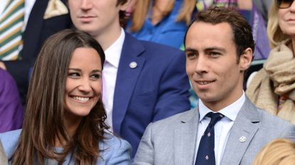 Pippa Middleton smiles at brother James Middleton at the Wimbledon tennis championships on June 24, 2013