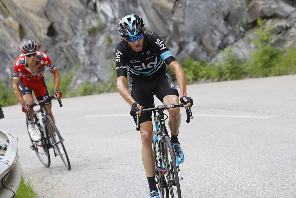 Chris Froome attacks on the final climb of stage 5 at Criterium du Dauphine.