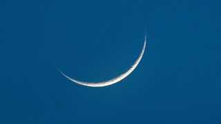 a tiny sliver of crescent moon