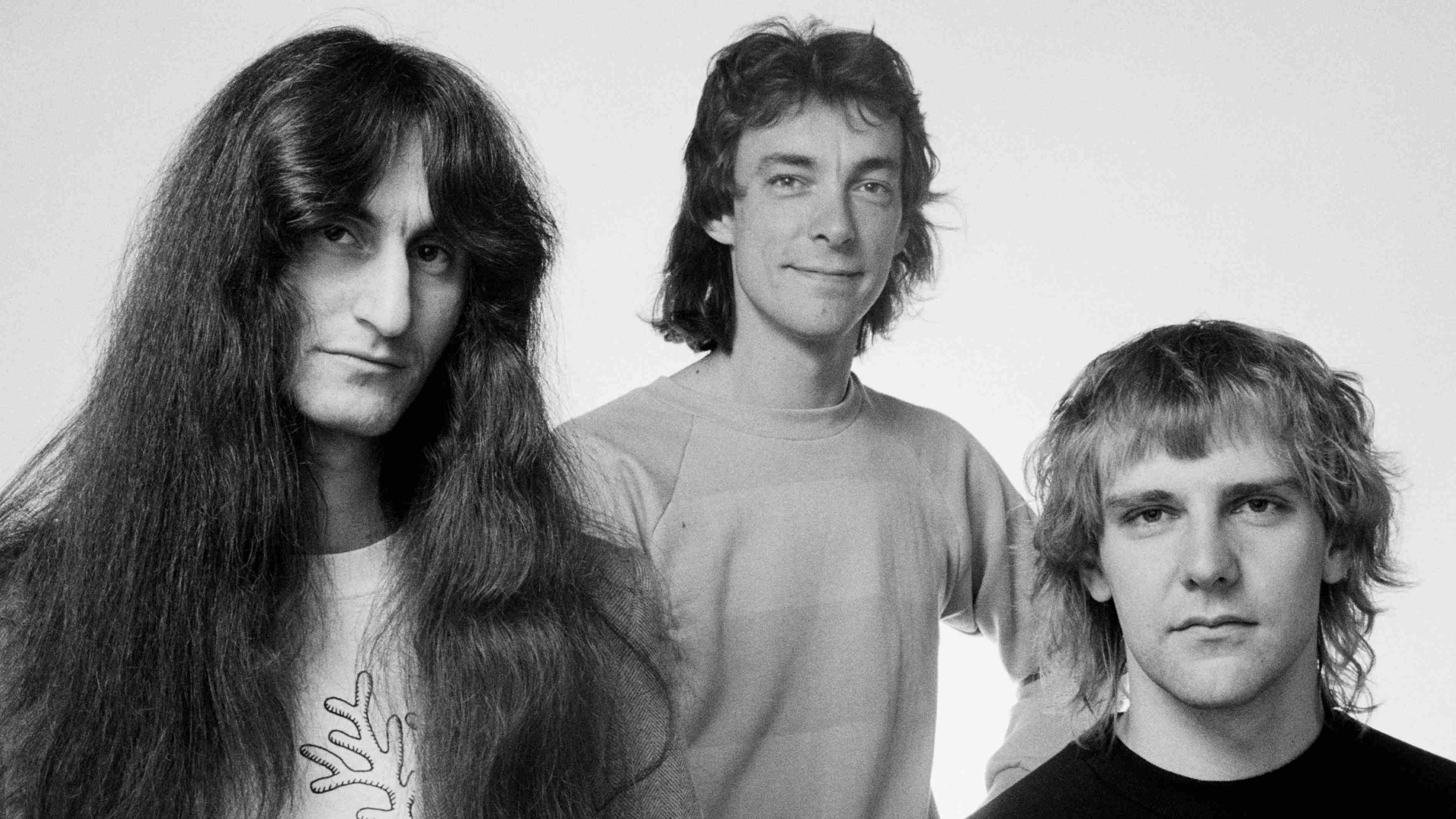 Rush posing for a photograph in 1980