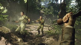 A player holding a whip in the jungle during the upcoming PC game, Indiana Jones and the Great Circle.