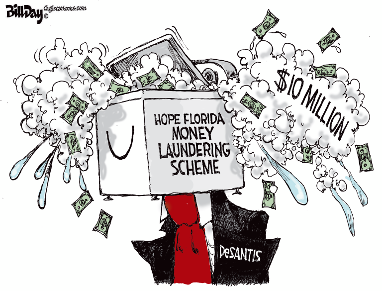 Ron Desantis is shown with his head stuck into a washing machine that is filled with soap suds and bundles of cash worth $10 million. The laundry machine is labeled "Hope Florida Money Laundering Scheme".