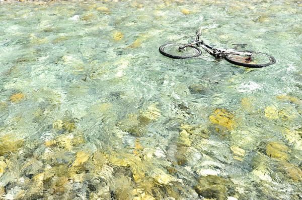 Sometimes bikes go for swim breaks, too.