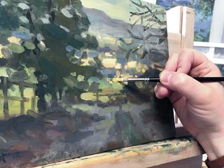 Artist painting a landscape