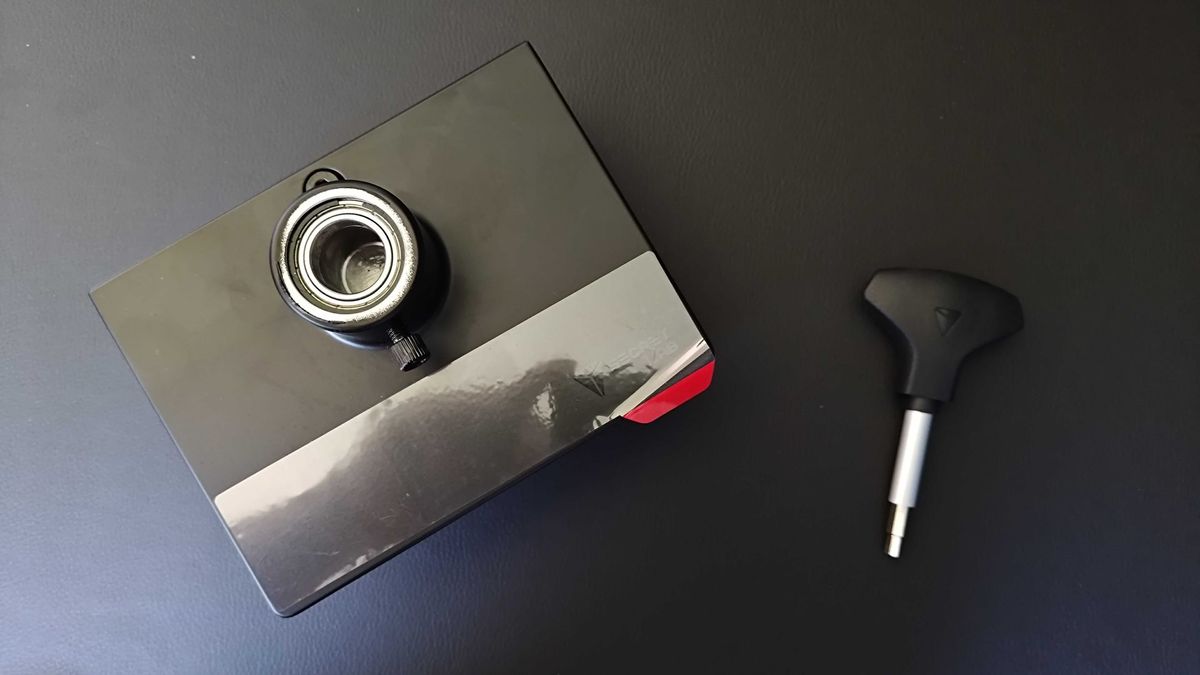Secretlab Heavy Duty Monitor arm base and hex screwdriver sitting on Magnus Pro desk